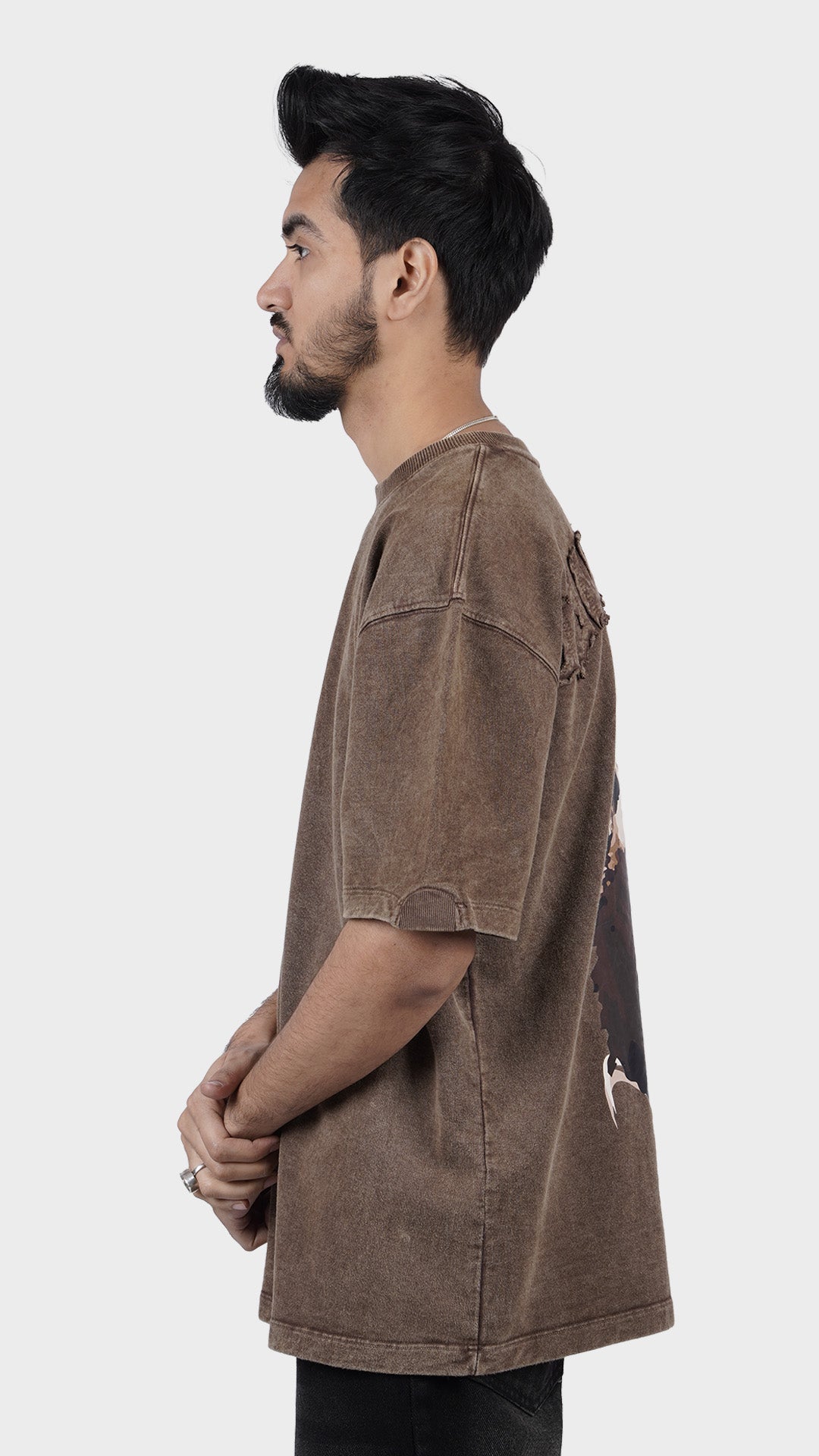 Drop shoulder baggy brown t-shirt showing loose casual fit