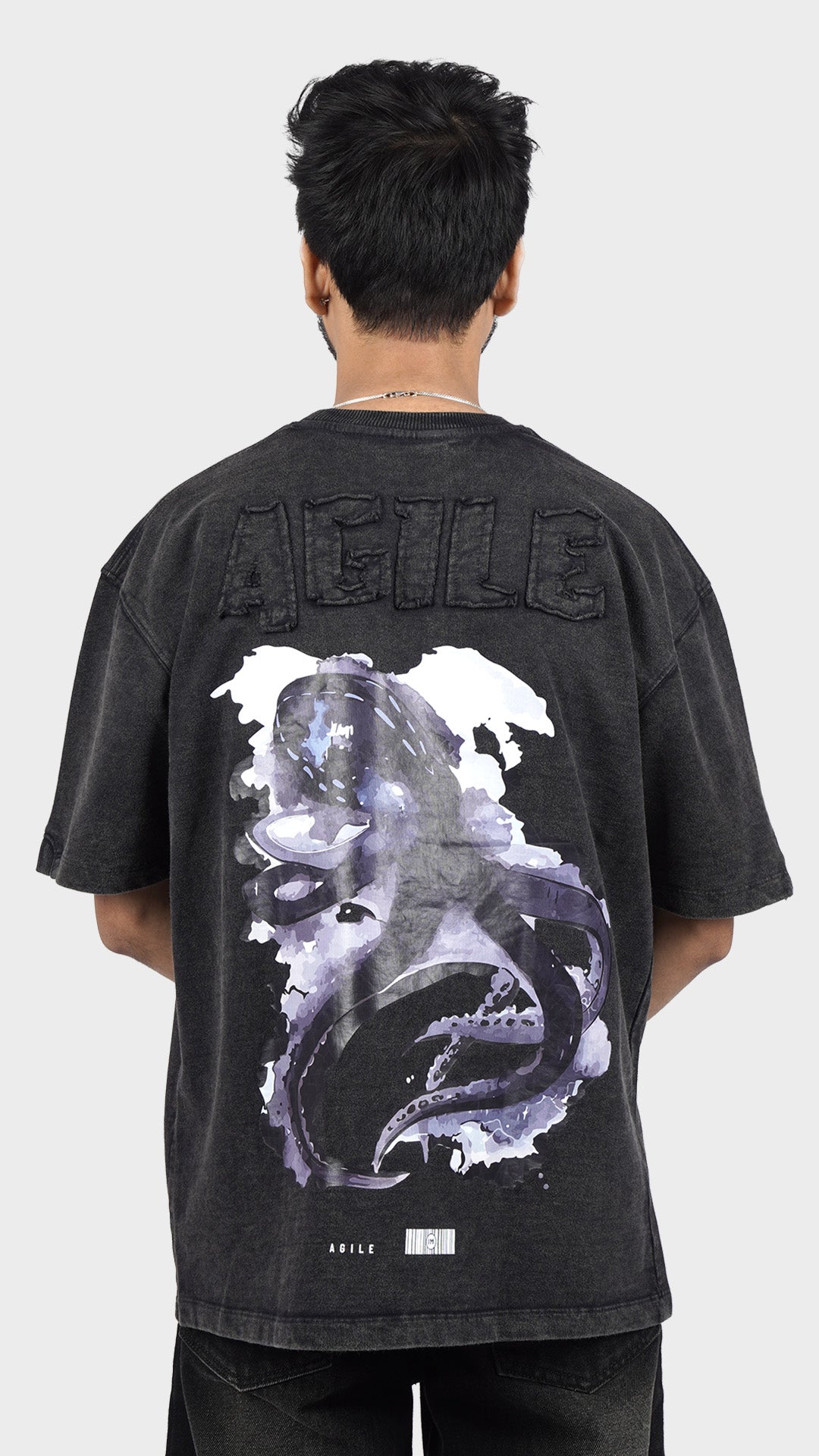Streetwear t-shirt with back graphic. Incroy Merv Agile t-shirt featuring purple octopus print artwork.