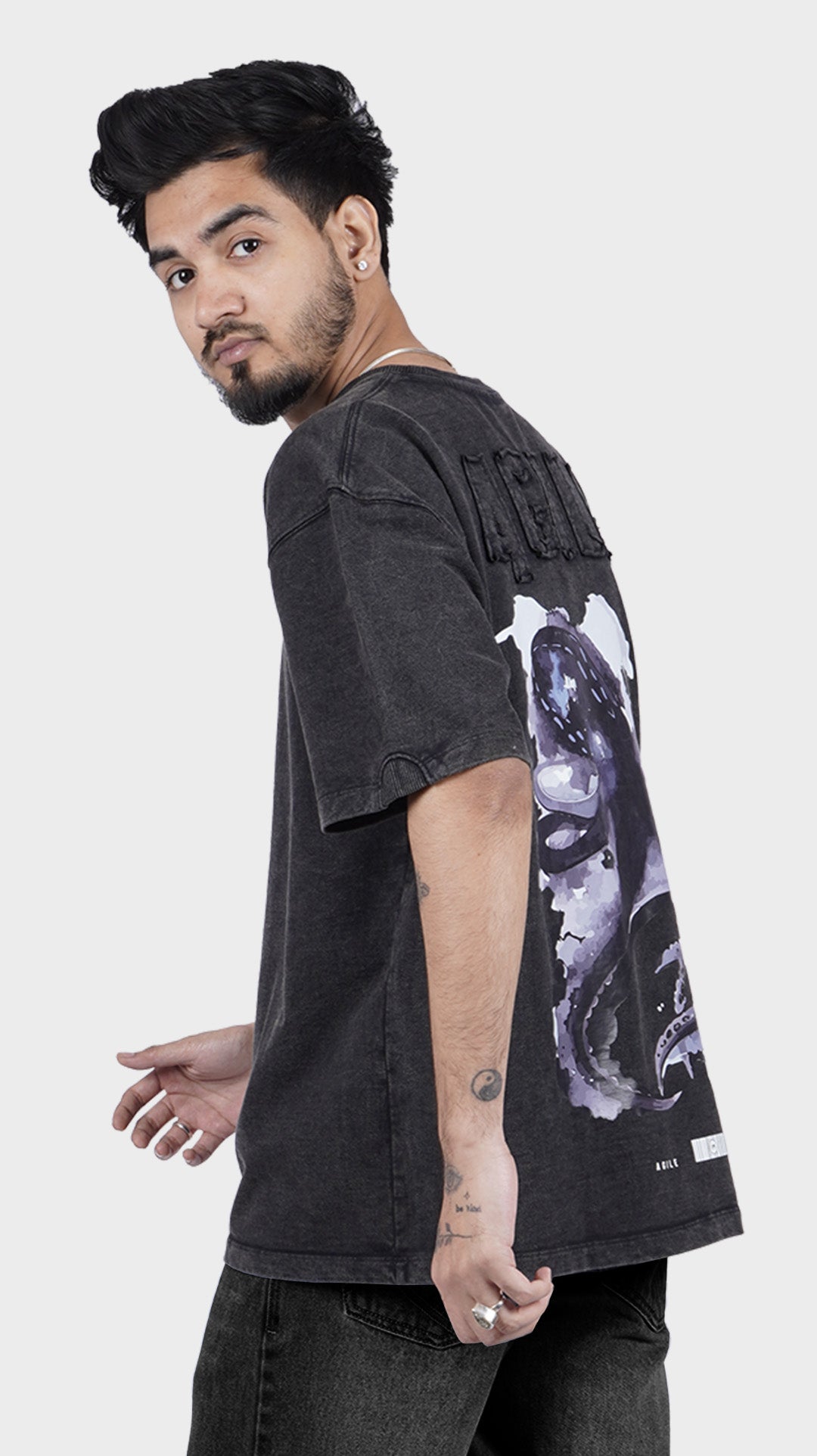 Heavyweight cotton streetwear t-shirt. Side profile of Incroy Merv Agile t-shirt showing loose dropped shoulder fit.