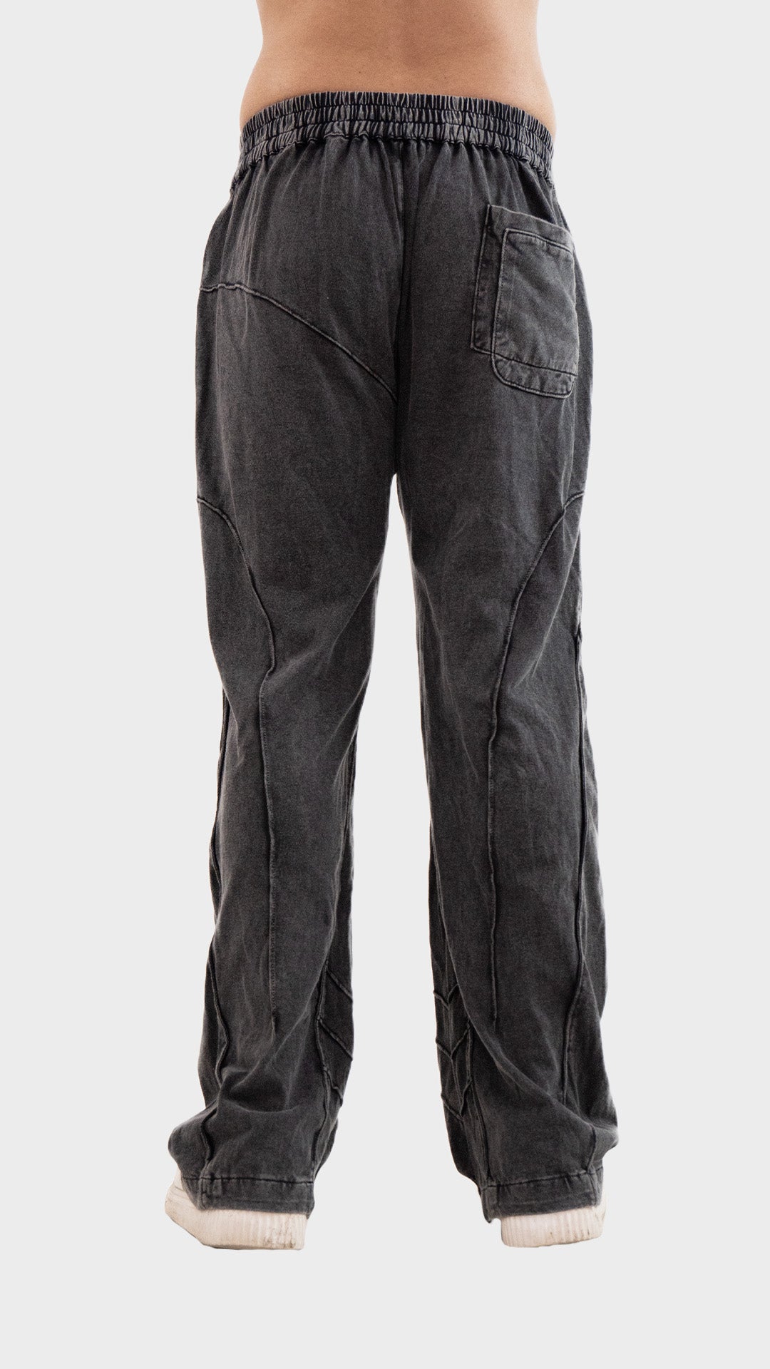 Back view of Incroy & Merv men's Beyond Trouser in charcoal cotton sinker fabric displaying rear seam paneling and single back pocket.