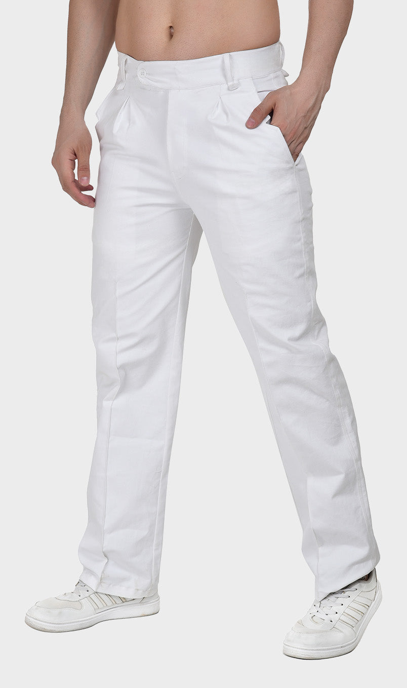 Side profile shot of men's white straight-leg trousers made from durable 13 oz cotton drill fabric, styled with white sneakers.