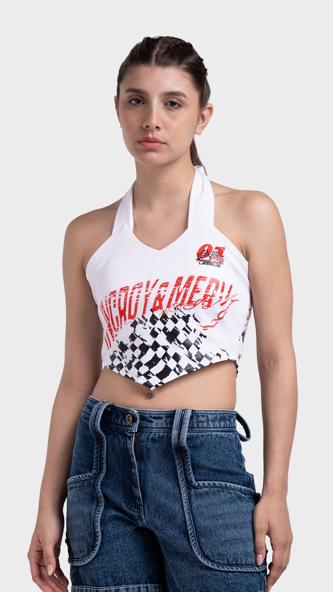 White graphic halter crop top featuring a red moto racer print and black checkered handkerchief hem.