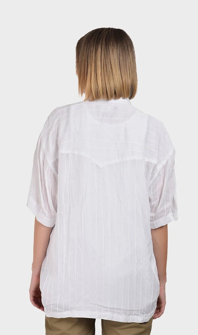 Direct back view showing the lightweight drape and sheer texture of a women's white rayon crepe shirt.