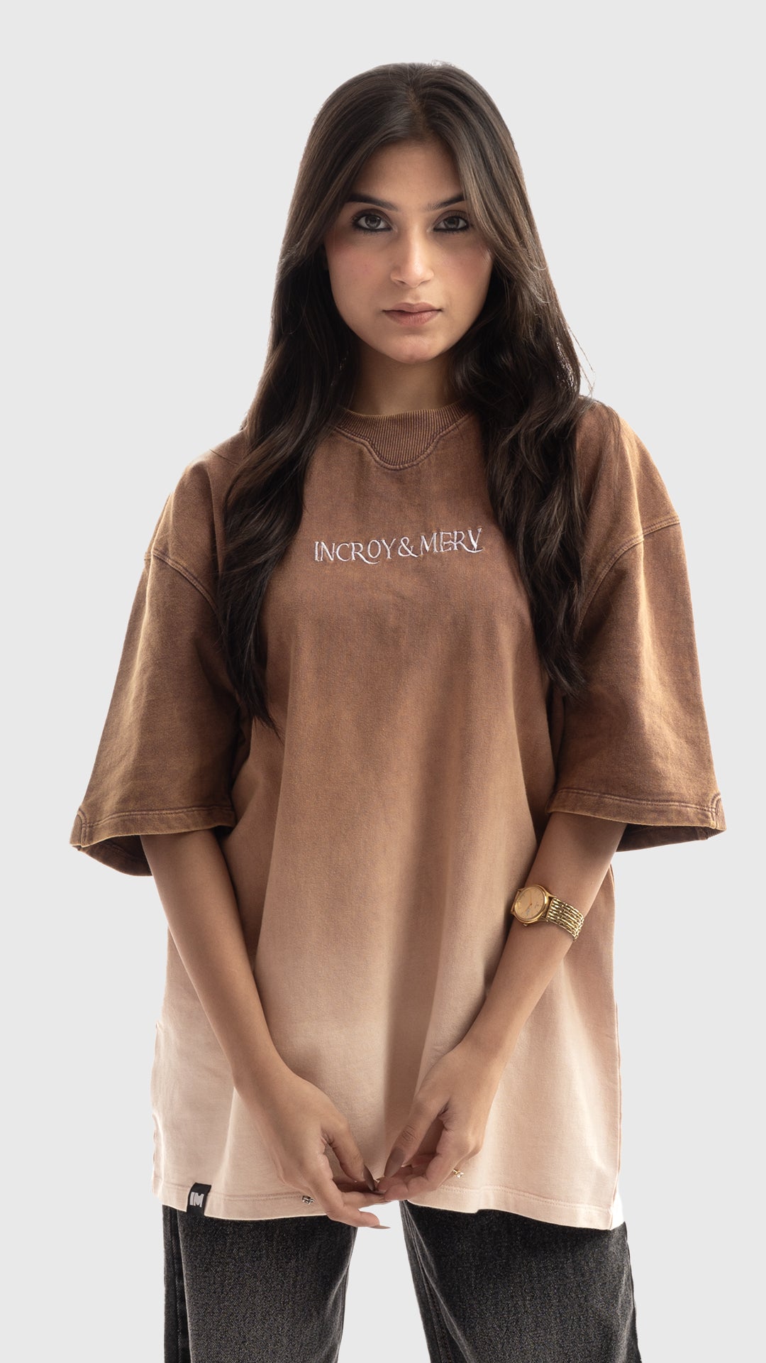 Front view of a women's brown to cream ombre oversized t-shirt.