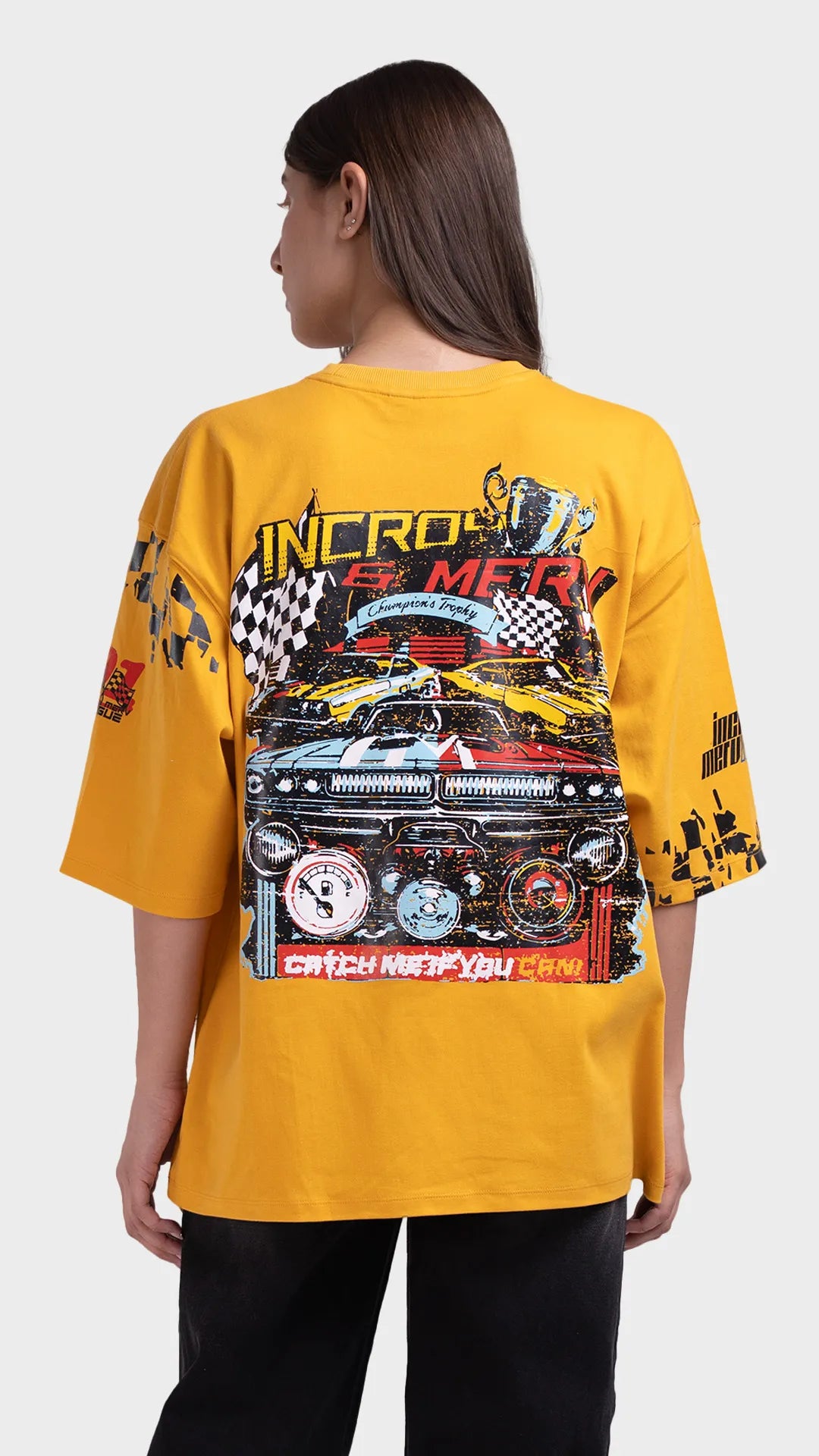 Racing graphic t-shirt with back print. Incroy Merv vibrant yellow streetwear tee featuring race car artwork.