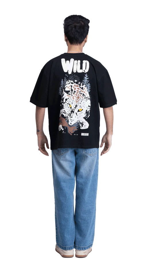 Oversized black graphic tee featuring a detailed snow leopard forest print, premium urban streetwear
