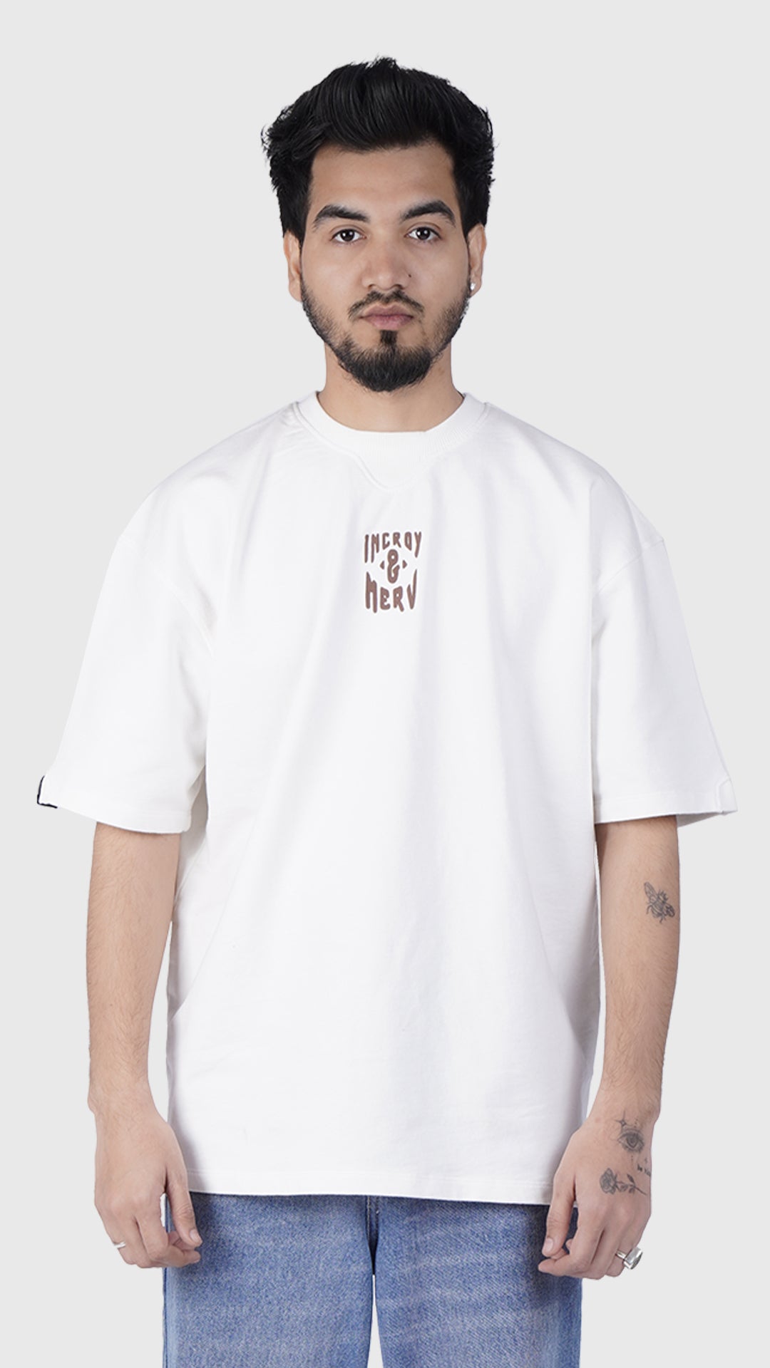 White crewneck boxy fit graphic tee with central chest logo