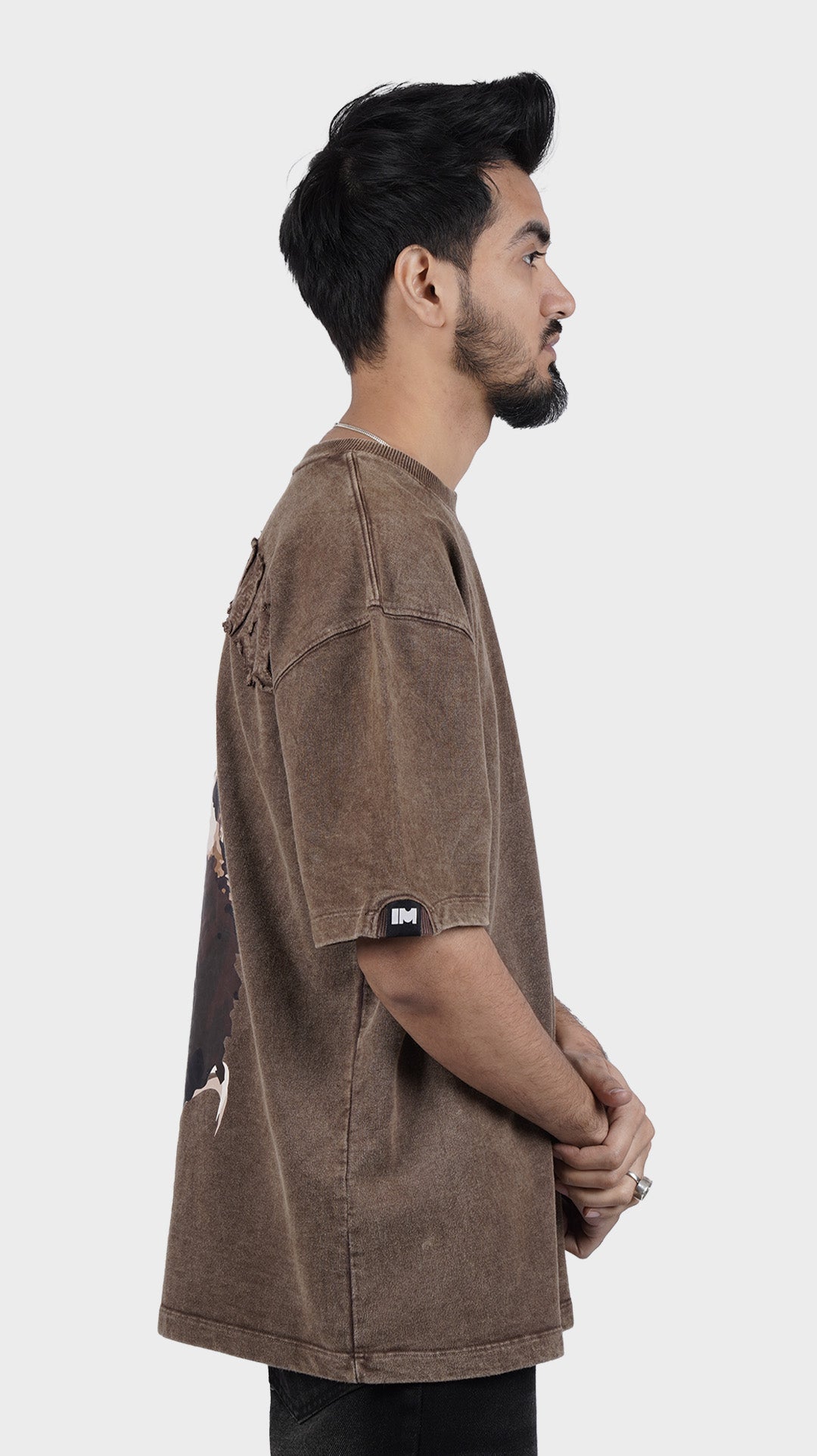 Heavyweight, relaxed fit brown tee with half sleeves patch detail, casual retro streetwear