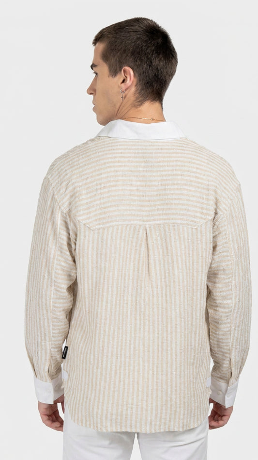Back view of a men's beige pinstripe dobby shirt featuring white contrast cuffs.