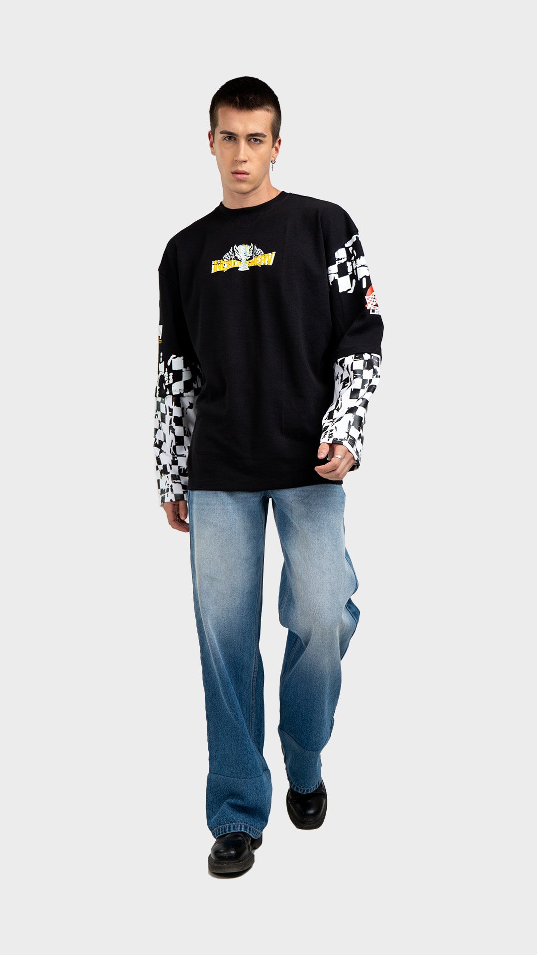 Black double sleeve racing tee outfit. Incroy & Merv oversized mediumweight long sleeve summer streetwear shirt styled with loose light wash jeans.