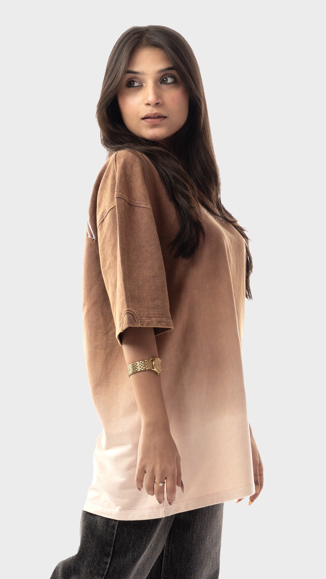 Side profile showing the relaxed fit of a brown ombre acid wash t-shirt.