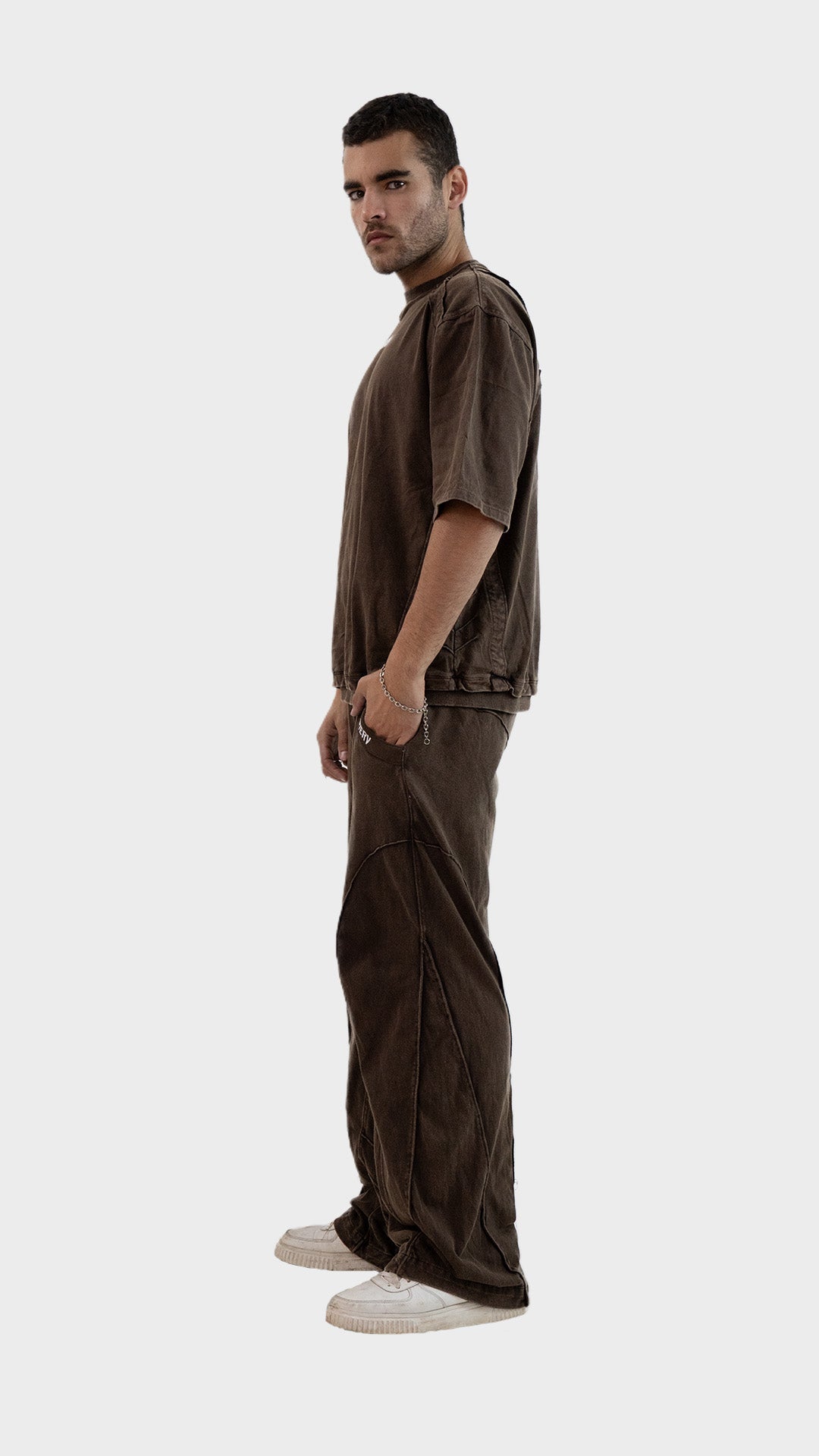 Full length side view of the Incroy and Merv Beyond Co-Ord Set in Brown made from sinker cotton fabric.