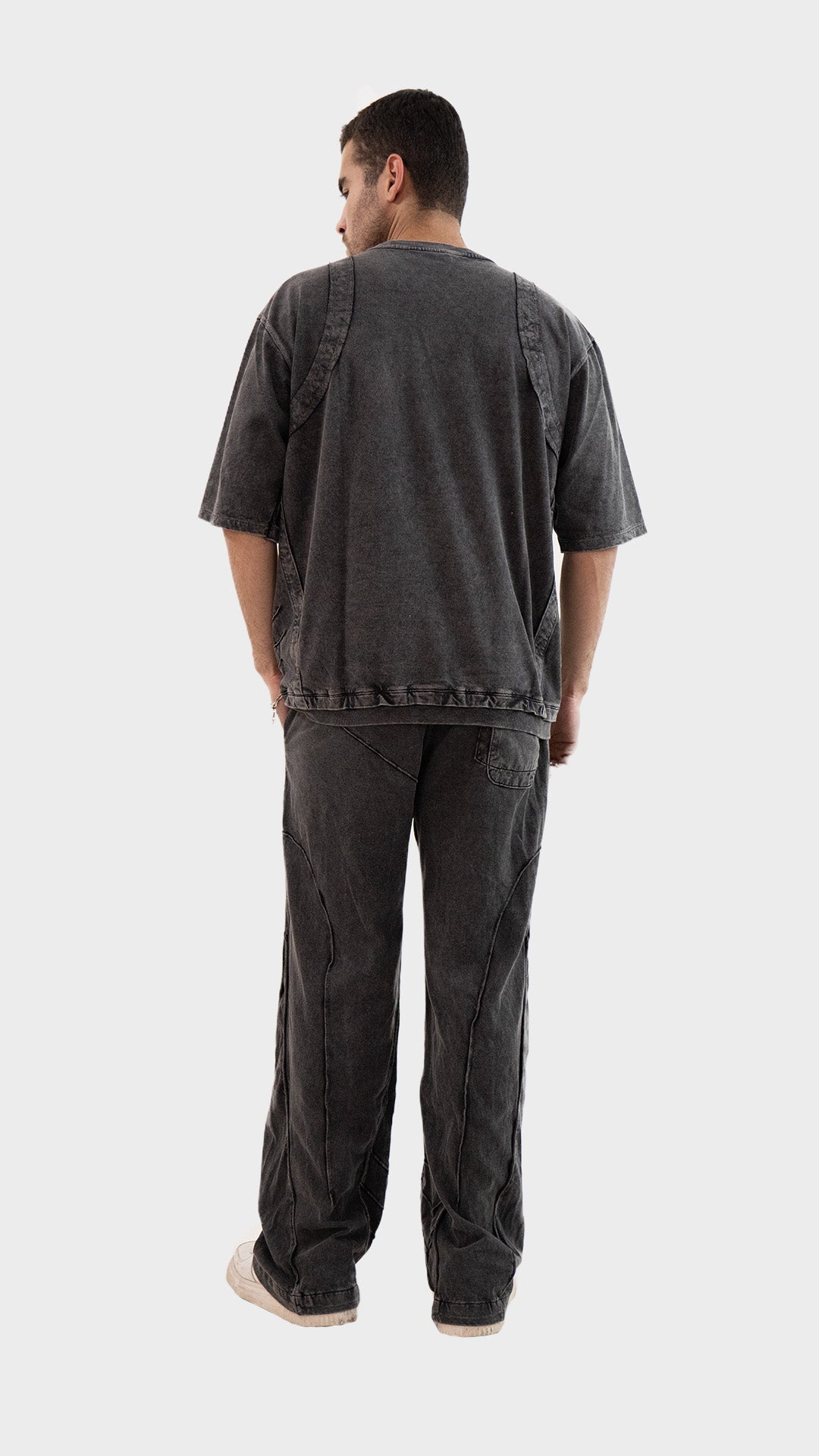 Back view of the Incroy and Merv Charcoal Beyond Co-Ord Set showcasing the oversized fit and acid wash finish.
