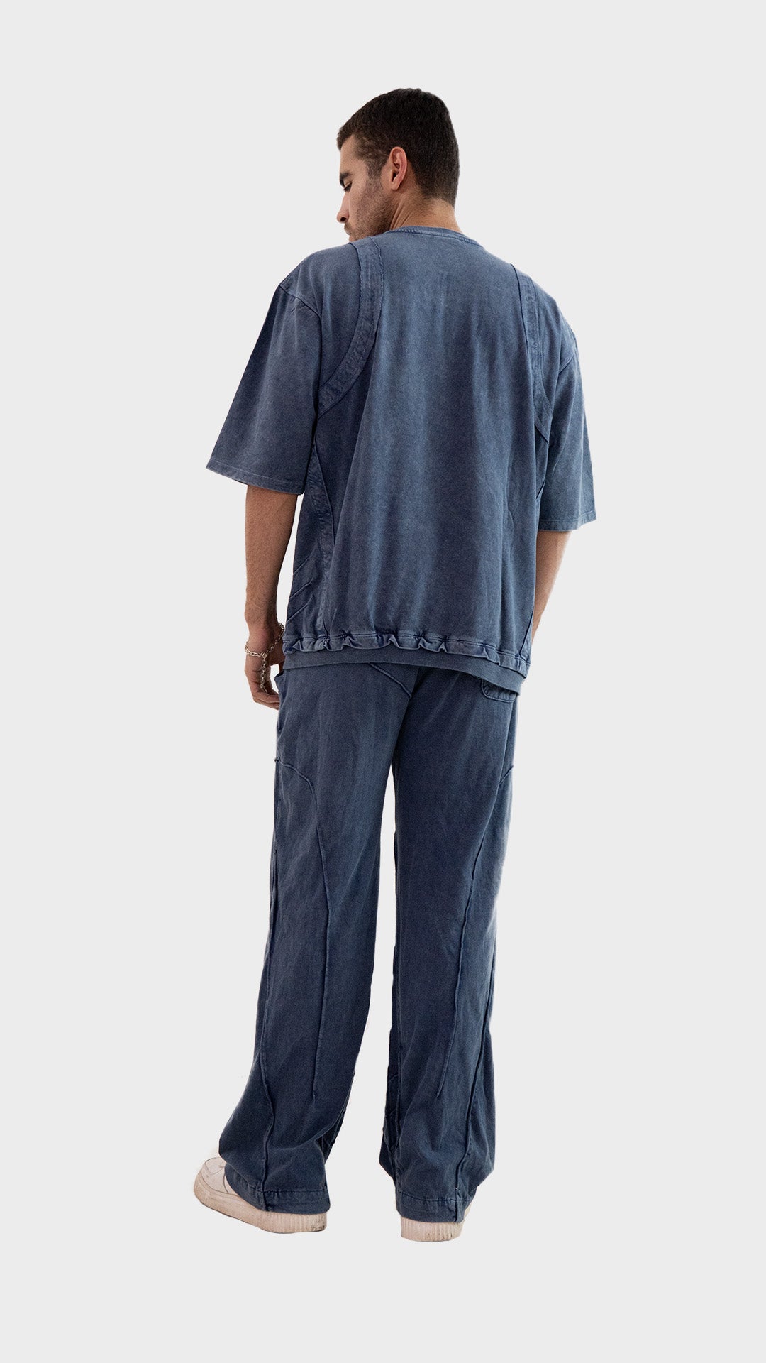 Back view of the Incroy and Merv Dusky Blue Beyond Co-Ord Set showcasing the oversized fit and acid wash finish.