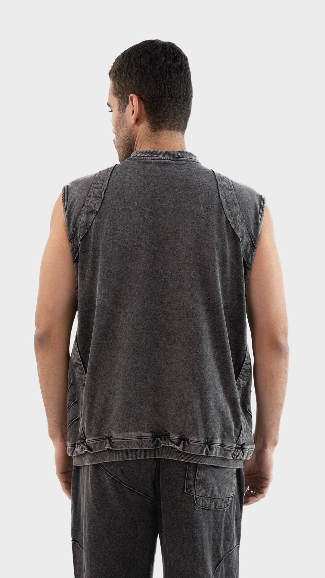 Back view of the Incroy and Merv Charcoal Beyond Tank Top showing vintage wash finish and ribbed hem.