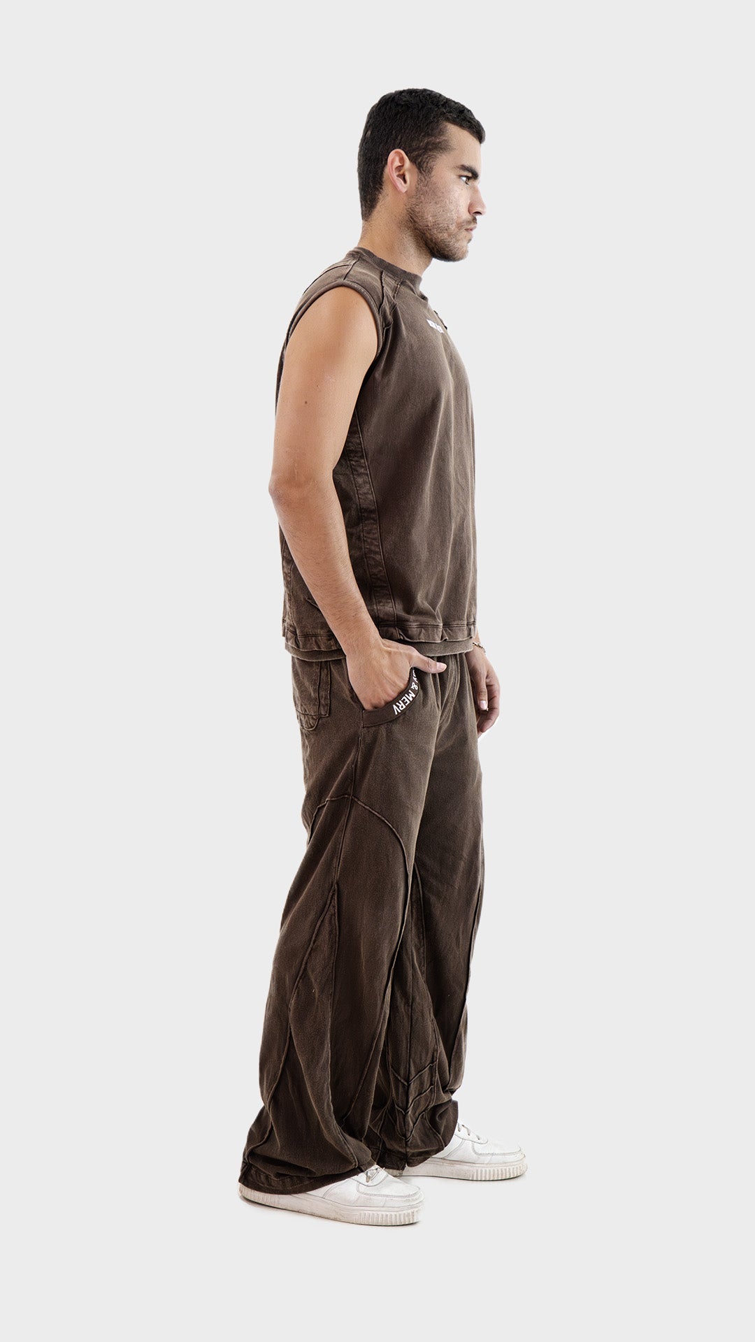 Side profile view of the Incroy and Merv Beyond Tank Top Co-Ord Set in Brown highlighting the relaxed streetwear fit.