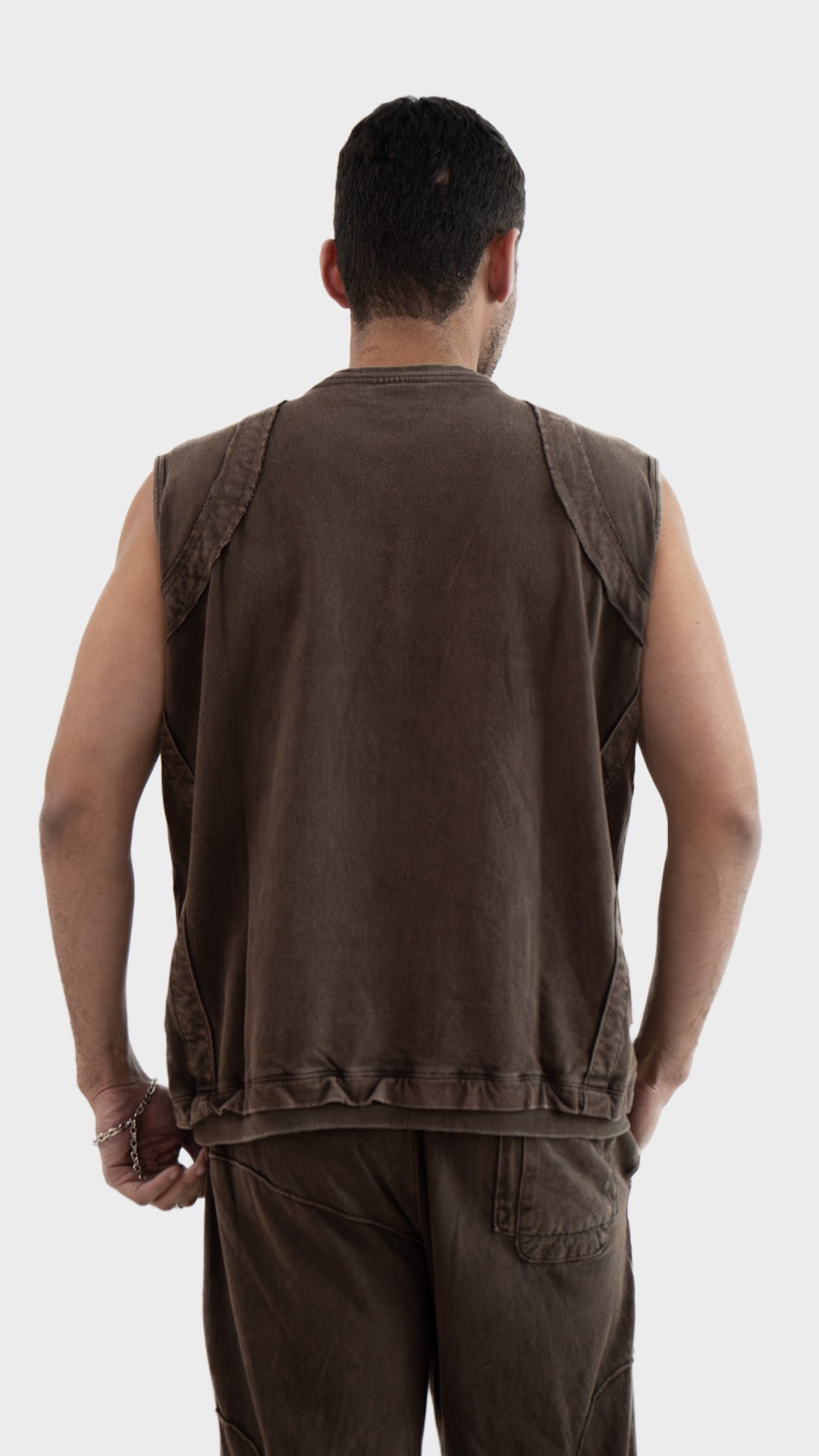 Back view of the Incroy and Merv Rustic Brown Beyond Tank Top showing vintage wash finish and ribbed hem.