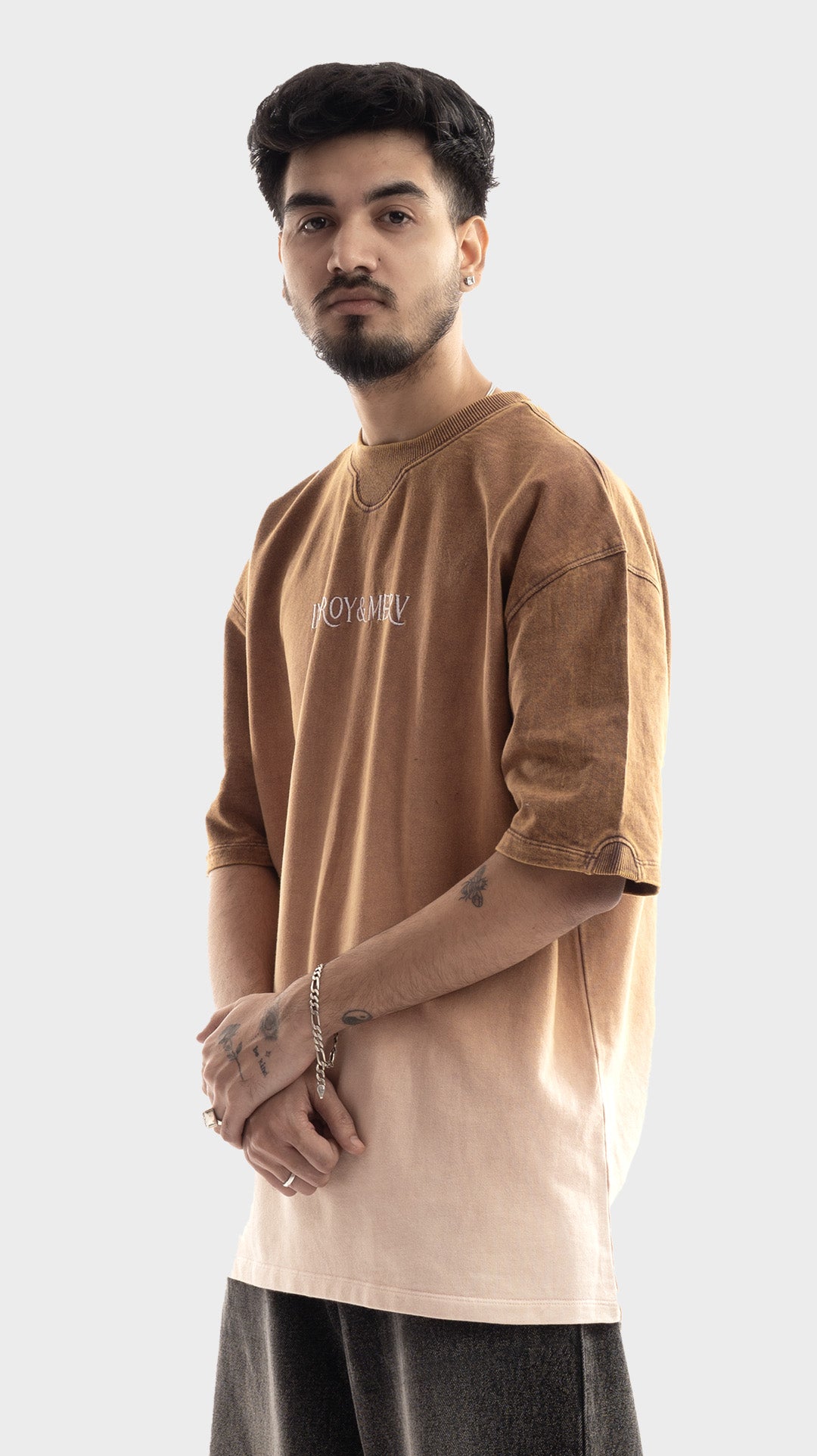 Side angle profile of Incroy & Merv relaxed fit washed earth brown heavyweight t-shirt.