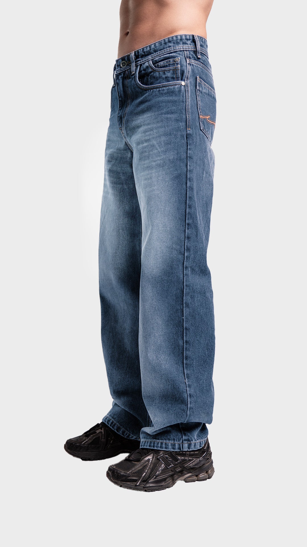Side angle profile of Incroy & Merv men's relaxed fit streetwear jeans.