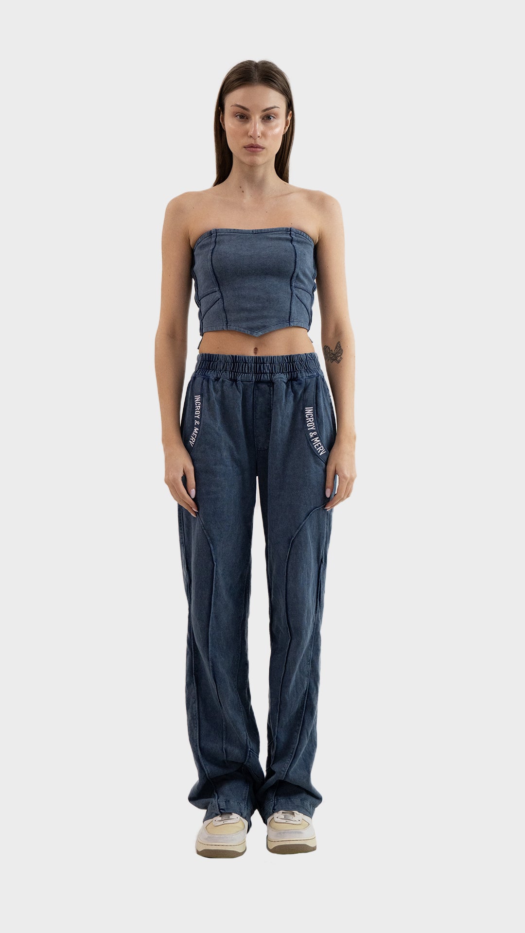 Full length front view of Incroy & Merv women's Beyond Co-Ord Set in dusky blue ribbed fabric with tube top and straight leg pants.