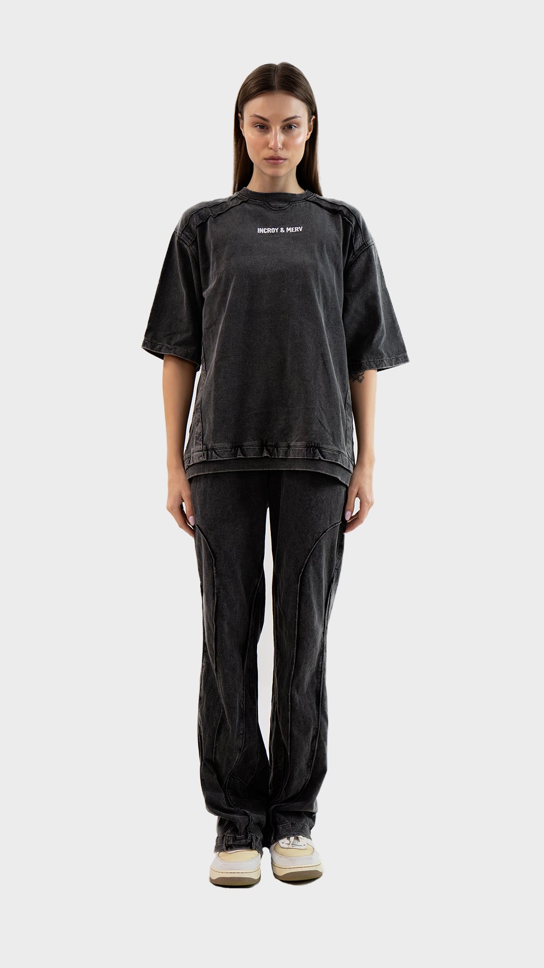 Full length front view of female model wearing Incroy & Merv women's charcoal Beyond Lower in cotton sinker fabric.