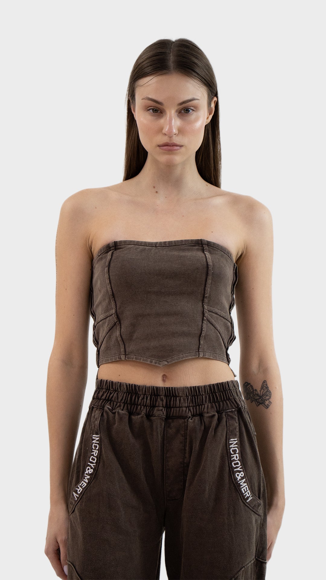 Front view of Incroy & Merv women's Beyond Tube Top in washed brown ribbed fabric with seam detailing.