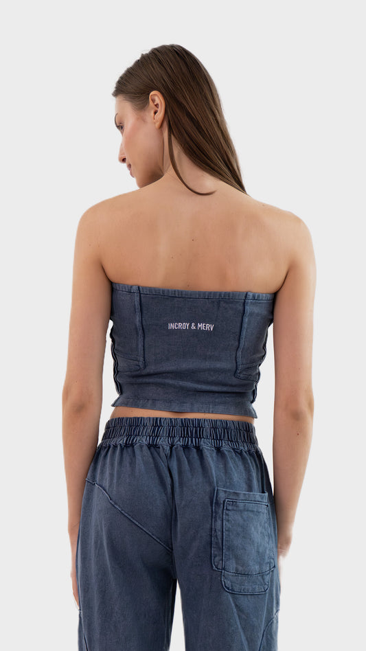 Back view of Incroy & Merv women's Beyond Tube Top in dusky blue ribbed fabric showing rear seam structure.