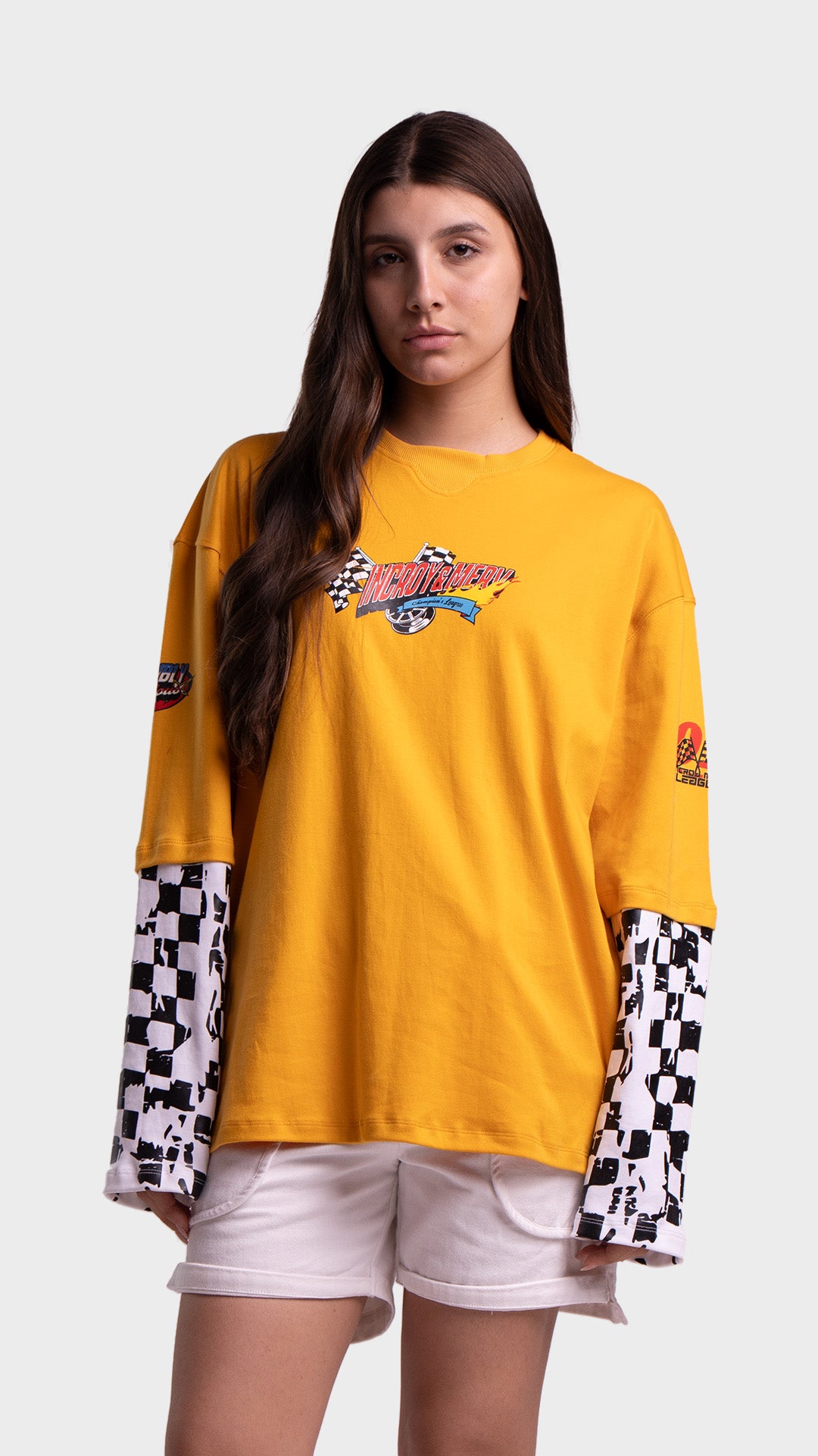 Incroy & Merv women's yellow oversized racing graphic t-shirt with checkered long sleeves.
