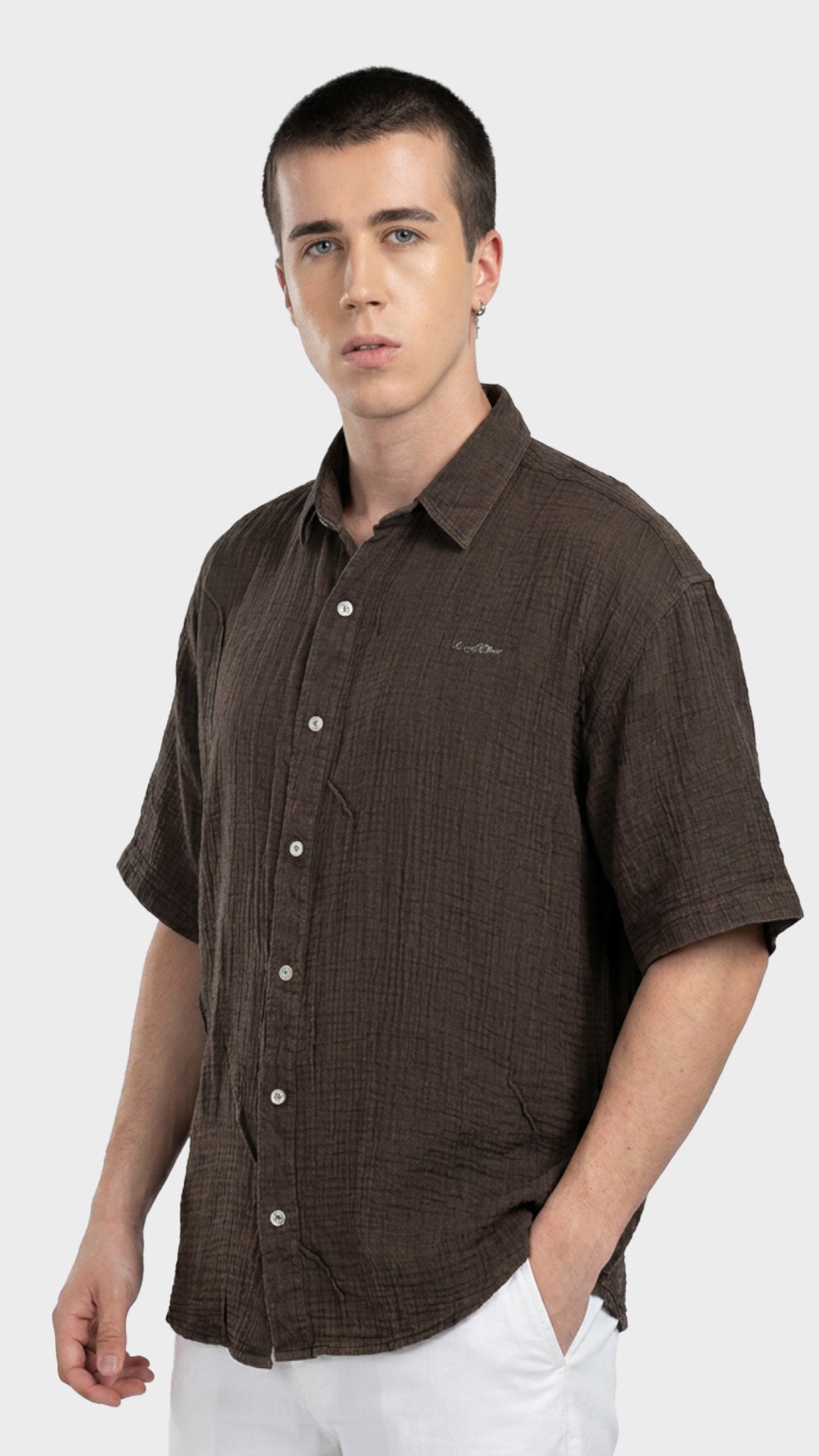 Front close-up of a men's dark brown 100% cotton double cloth short sleeve shirt.