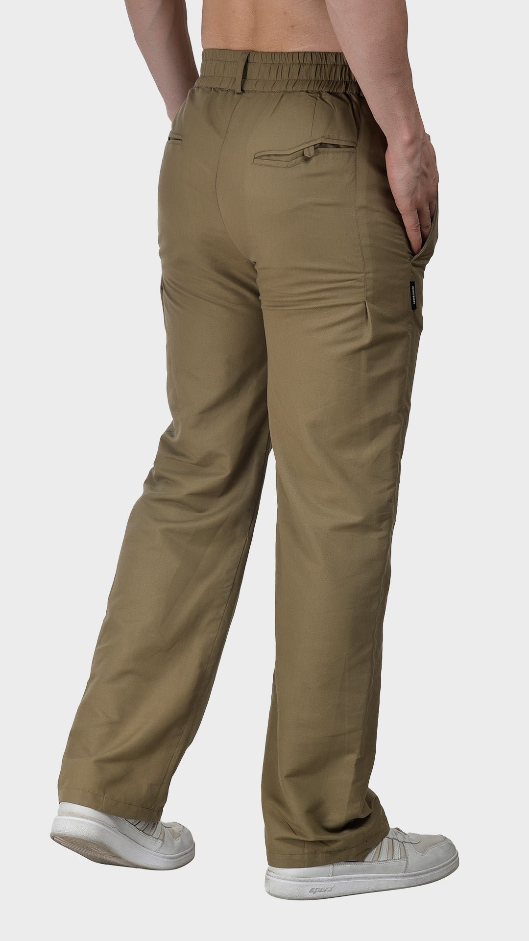 Back three-quarter view showing the tailored seat, rear welt pocket, and straight-leg fit of men's khaki cotton Oxford trousers.