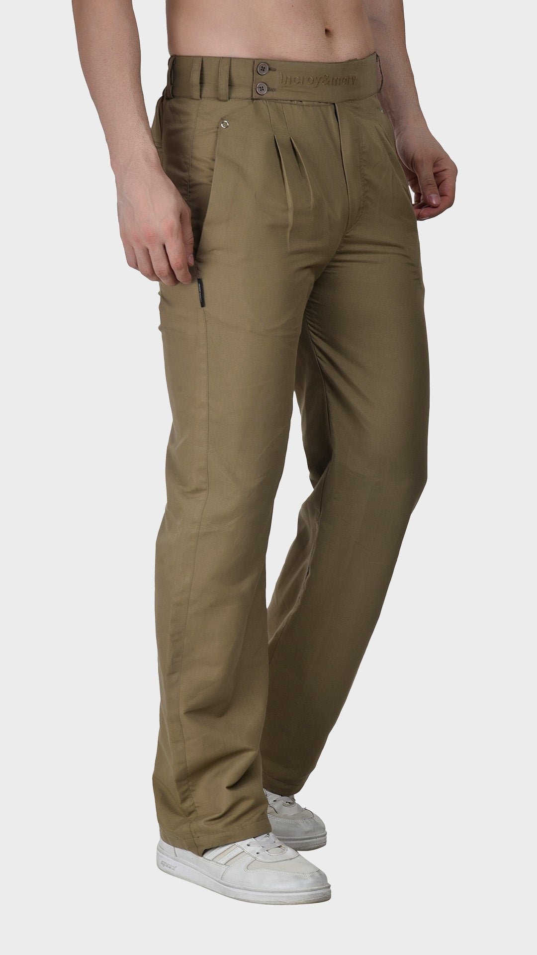 Side profile view of men's olive khaki cotton Oxford trousers highlighting the double-button side waist tab and relaxed straight cut.