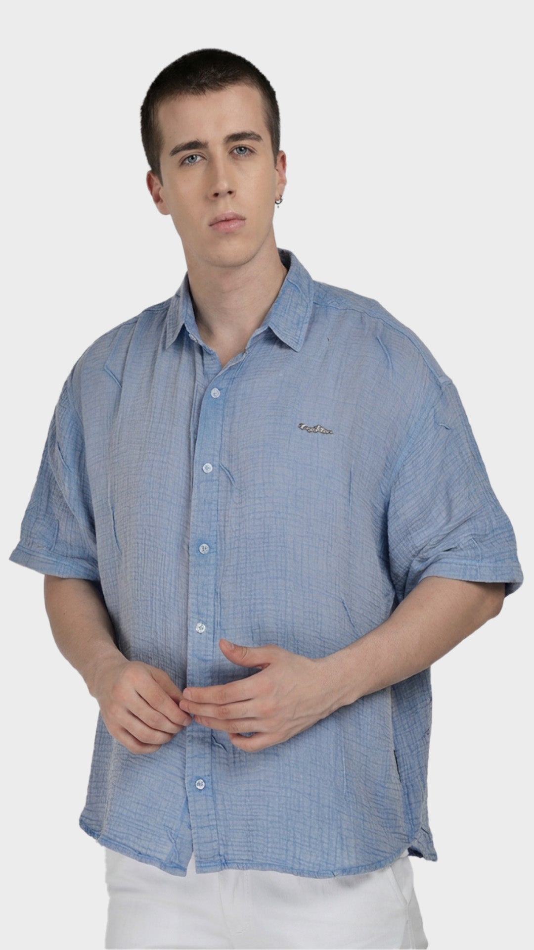 Front view of a men's light blue 100% cotton double cloth short sleeve shirt.