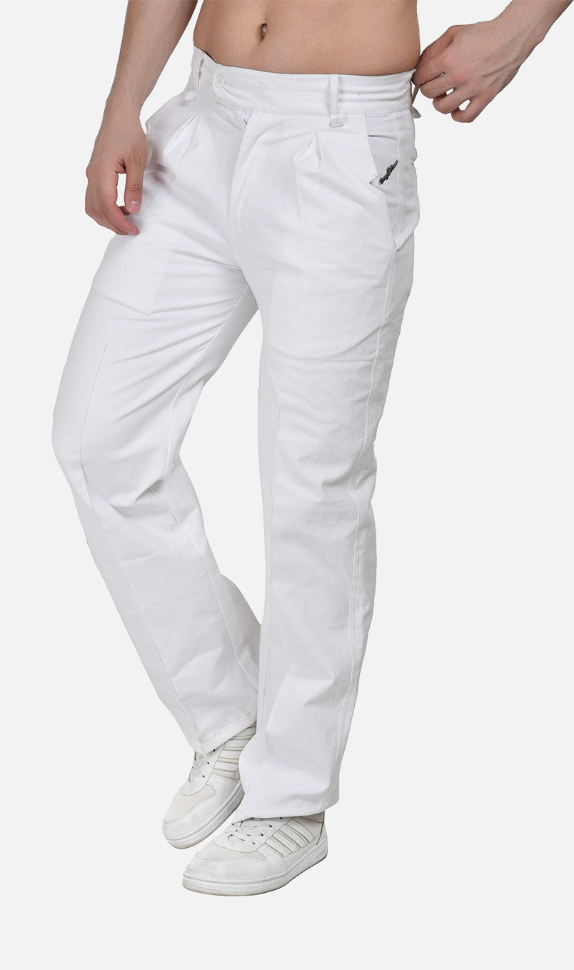 Dynamic front angle of men's white 13 oz cotton drill trousers highlighting the extended buttoned waistband tab and double pleat construction.