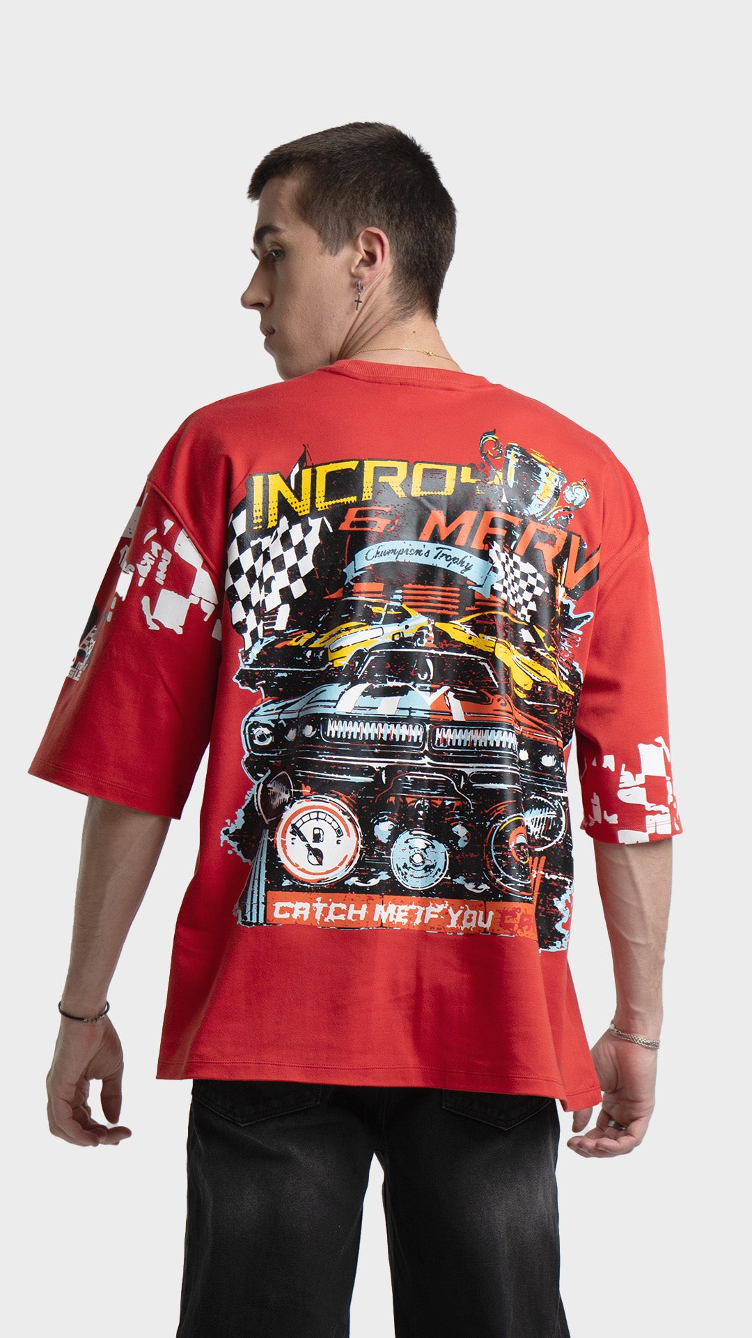 Racing graphic t-shirt with large back print. Incroy & Merv bold red streetwear tee featuring vibrant vintage race car graphic.