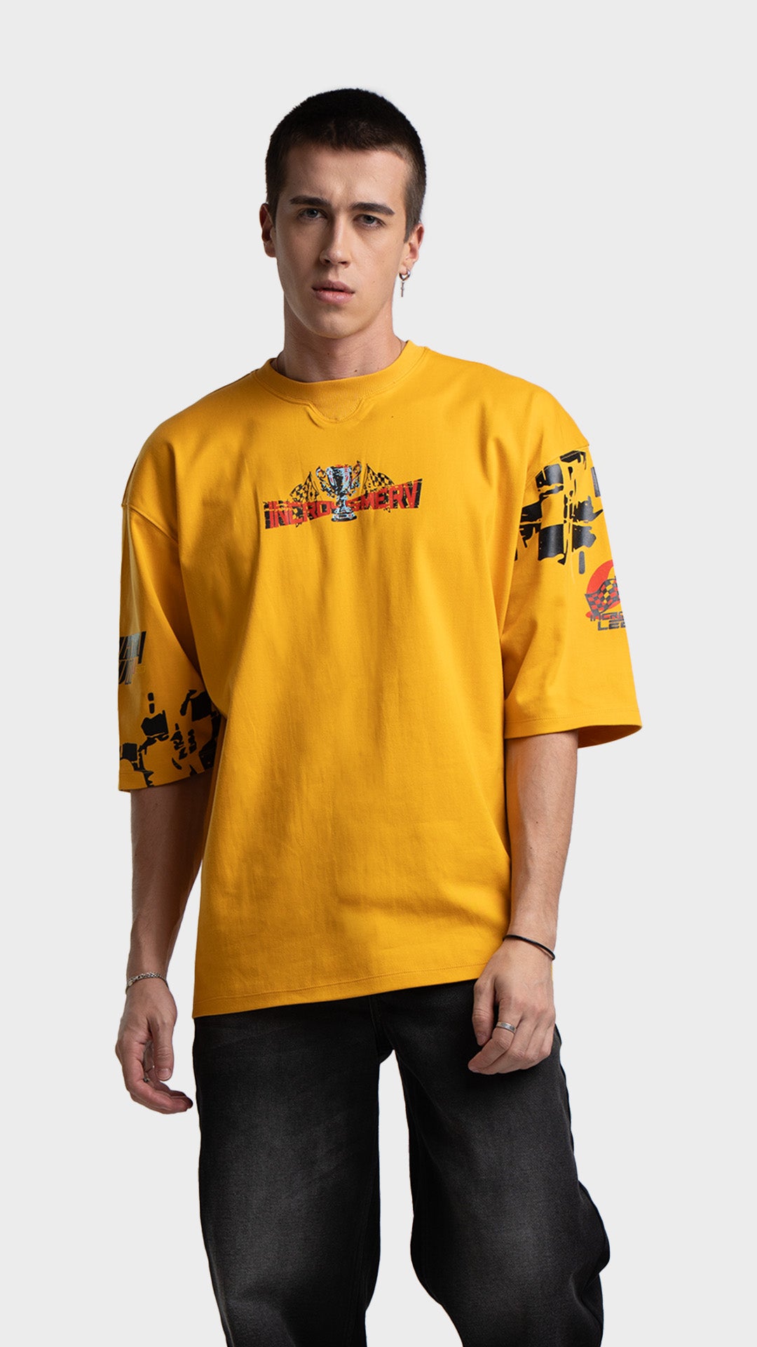 Mens yellow oversized graphic tee. Incroy & Merv premium streetwear t-shirt with chest logo detail.