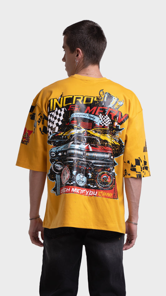 Racing graphic t-shirt with large back print. Incroy & Merv yellow streetwear tee with vintage race car graphic.