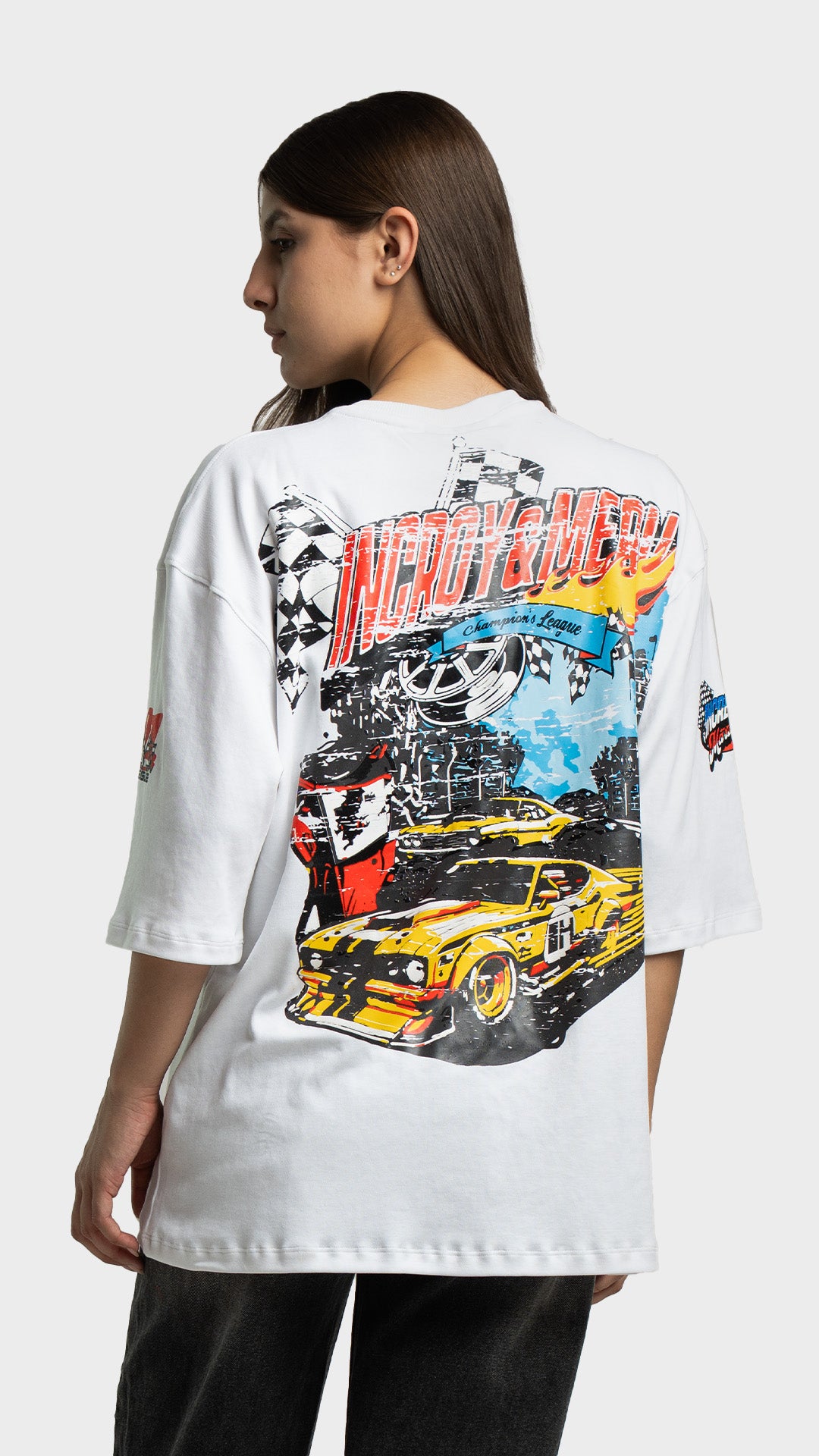 Back view of a white t-shirt featuring a large yellow vintage racing car graphic.