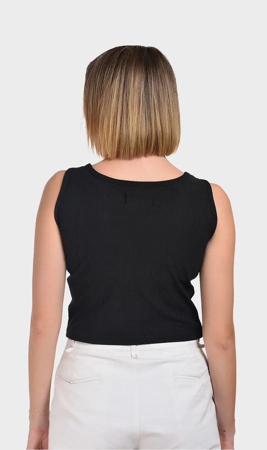 Direct back view showing the fit and texture of a women's black ribbed sleeveless top.