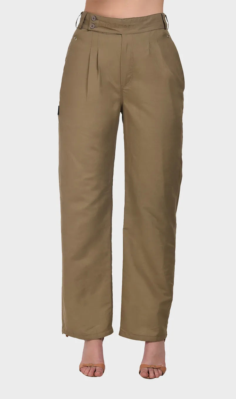 Front profile of a model wearing high-waisted khaki cotton Oxford wide-leg trousers paired with open-toe heels.