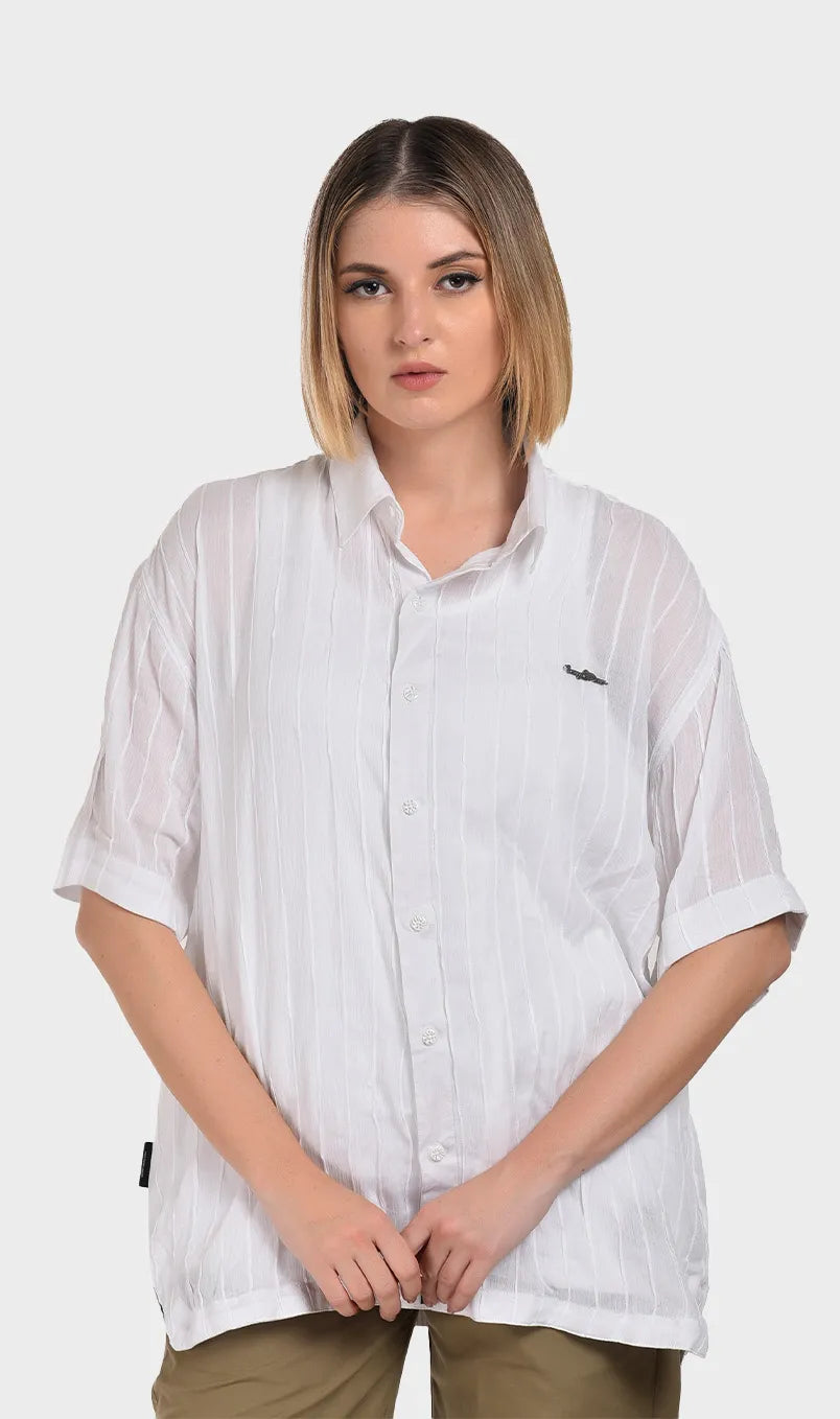 Front view of a women's white short-sleeve button-down shirt crafted from textured rayon crepe fabric with subtle stripe details.