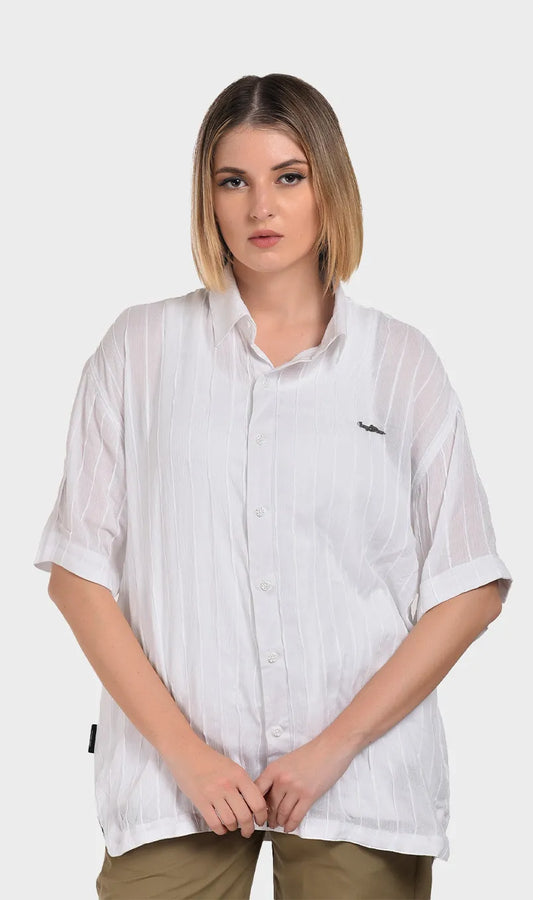 Front view of a women's white short-sleeve button-down shirt crafted from textured rayon crepe fabric with subtle stripe details.